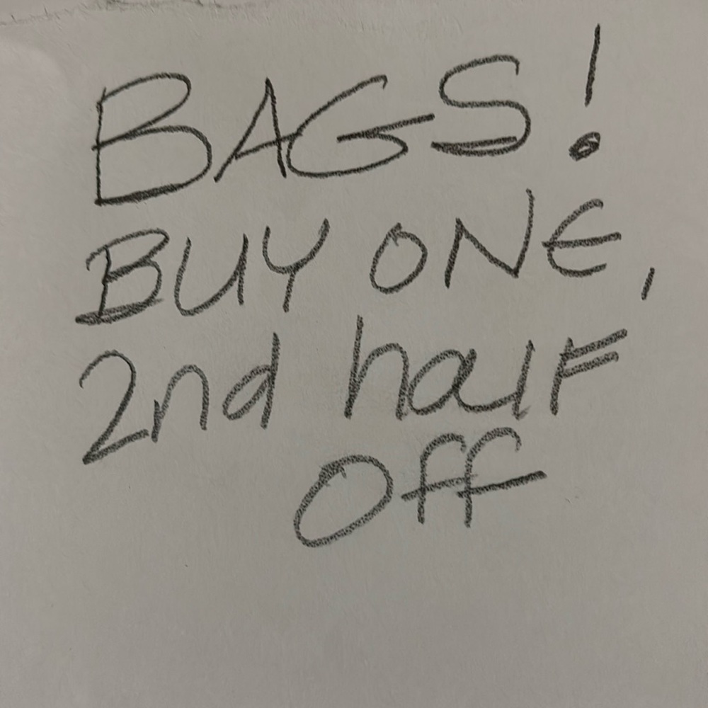 Bags buy one , 2nd half off